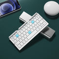 Mini Teclado Plegable Bluetooth Teclado Inalámbrico Soporta 3 Dispositivos con Soporte Teclado Plegable Recargable para Teléfono Tablet