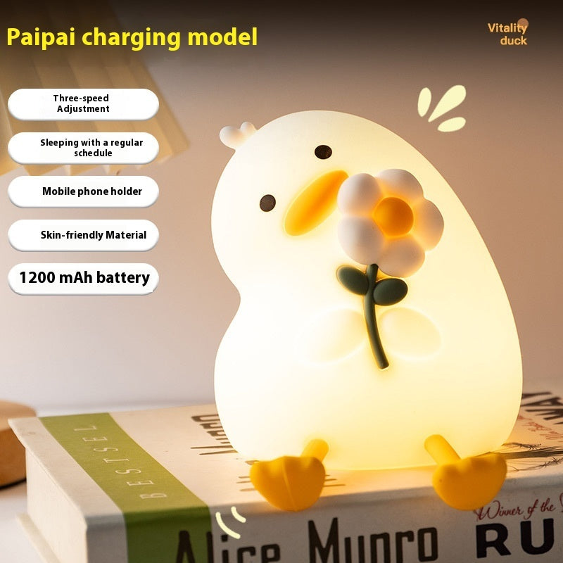 Luz nocturna pequeña de pato con flor de vitalidad para mesita de noche con USB