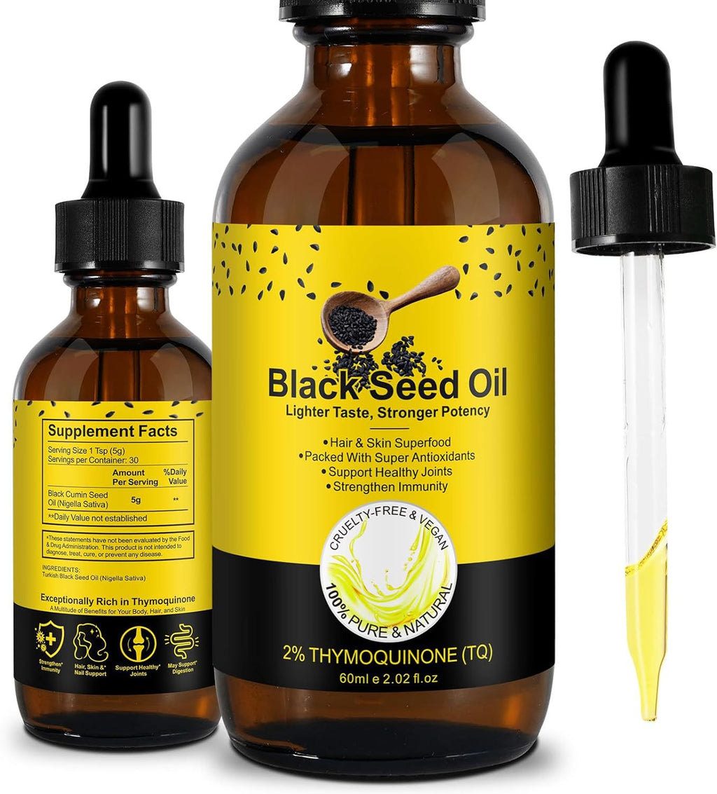 Gotas de aceite de semilla negra con vitaminas