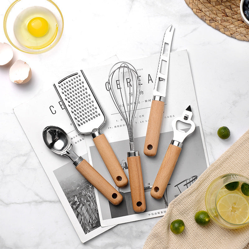 Artilugio de cocina creativo con mango de madera