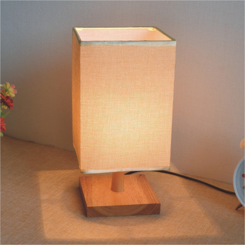 Lámpara de mesa creativa de madera maciza para mesilla de noche, pequeña lámpara de noche.