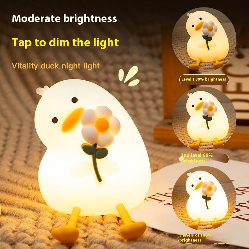 Luz nocturna pequeña de pato con flor de vitalidad para mesita de noche con USB