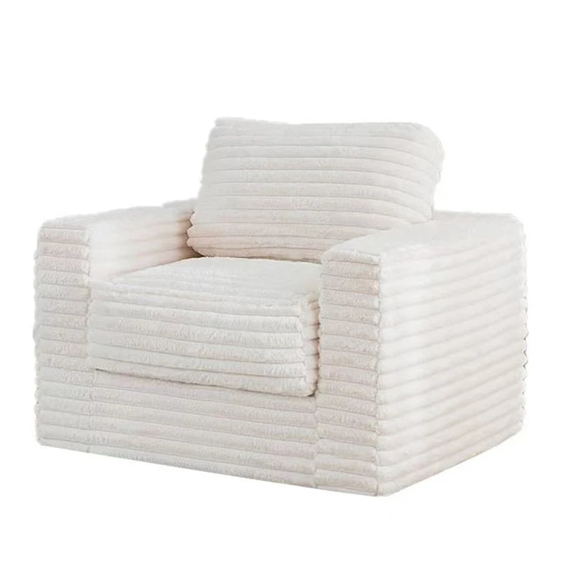 Sofá moderno con respaldo capitoné, cómodo mobiliario de salón con botones decorativos, sofá cama con cabecera en gris o beige.