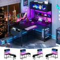 Escritorio para juegos en forma de L con tomas de corriente y luces LED, escritorio de computadora reversible de 49 pulgadas con estante superior, tablero perforado y vitrina