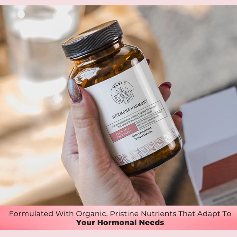 Cápsulas femeninas de vitaminas y hormonas